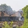 Fire at a former UK military base kills 2 firefighters and a civilian