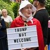 Scotland locals protest Trump's visit with cruel signs... as unbothered president enjoys his golf getaway