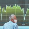 Asian shares are mostly higher, tracking US rally into record heights