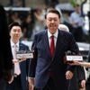 South Korea's jailed ex-leader Yoon resists questioning by taking off prison uniform