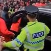 Driver 'who ploughed through Liverpool victory parade is a married father-of-three businessman': Neighbours at 'suspect's £300,000 detached home' tell of their shock as police continue to quiz 53-year-old over attack that hurt dozens