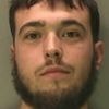 Manhunt for seaside murder suspect: Police release mugshot of 22-year-old wanted over death of man 25, found with fatal head injuries in house
