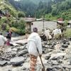 Rescuers search for dozens missing after deadly flash floods kill 4 in northern India
