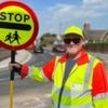 Lollipop man told to stop high-fiving kids as it slows down traffic