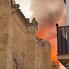 Huge blaze rips through ancient Spanish church: Firefighters battle to save major tourist attraction