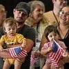 South Africa's president mocks white 'cowards' for fleeing the country to resettle in US