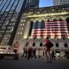 Asian benchmarks are mixed after Wall Street edges down from record highs