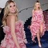 Heidi Klum puts on a leggy display in a pink floral floor-length gown as she poses at luxury five-star hotel ahead of Cannes Film Festival opening
