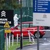 Knife attacker is on the run after teenager, 19, is stabbed to death in Powerleague football car park