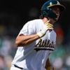 Kurtz, Butler power A's past Red Sox 5-4, end Chapman's hitless streak of 50 batters, 17 appearances