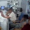 Distraught father dragged away from his dying six-year-old daughter's intensive care bedside by police loses legal fight against the force