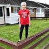 Women at war with council over privacy fence after jobsworths say it is not 'in keeping' with local area - and vow to chain themselves to it