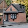 The man who built a two-storey HOUSE on his driveway: How family waged war with council over illegal home... but three years later who won?