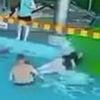 Water park horror leaves boy, six, with ruptured liver when woman flies off slide and crashes into him after child's father ignored warnings