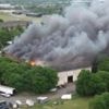 Firefighters and member of public die in blaze at business park