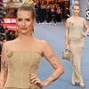 Lottie Moss wears a shimmering gold corset and fitted skirt as she attends Caught Stealing screening in London