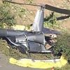 Hero pilot of helicopter in Isle of Wight crash steered it to safety: Aircraft that smashed into field had four people on board doing flying lesson - as one is treated in hospital after being airlifted to safety