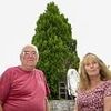 Couple finally win battle over neighbours' huge untrimmed hedge that left them suffering 'five years without sunshine'