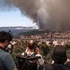 Dozens hurt as wildfires bear down on Marseille: Mayor calls for lockdown after looting breaks out as inferno razes homes and cars as it races towards city centre
