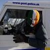 'Anti-British' rappers Kneecap who face terror probe for urging fans to 'kill your MP' have received nearly £2million in taxpayer cash - including £15,000 to hire a fake police car