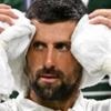 Djokovic overcomes physical issues to reach second round