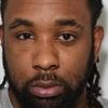 Rapper who threatened charity worker in music video before stabbing him to death in front of his young son at barber shop is jailed