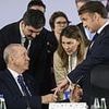 Bizarre moment Turkey's Erdogan grabs Emmanuel Macron's finger at European summit and refuses to let go in 'power move'