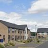 Tributes pour in for 'lovely teaching assistant', 71, found dead at home after 'disturbance': Man, 78, arrested