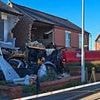 Moment JCB tractor veered off the road and crashed into a house after colliding with drug driver's Mercedes when it jumped red light