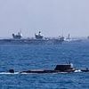 HMS Prince of Wales leads show of military force as £3.5billion aircraft carrier spearheads fearsome fleet of warships in the Mediterranean - with crew ready to defy China over Taiwan