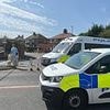 Man is gunned down in 'drive-by shooting' at petrol station: Police hunting killer in 'stolen car'