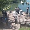 Body of woman found chained 'by the neck' and tied underwater by two dumbbells