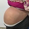 Knocked up then locked up: Woman is caught smuggling drugs in fake baby bump