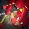 Hammer of justice! Drug dealers watch in bewilderment as police dressed in superhero costumes smash down door and shut down narcotics operation