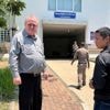 US scholar leaves Thailand after charges of insulting monarchy are dropped