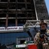 Officials try to identify 18 bodies in deadly Iraq shopping mall fire
