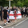 'Save Our Kids' protest turns violent: Thugs clash with police as residents with homemade banners gather at asylum hotel after migrant appears in court over schoolgirl sex assault