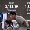 Asian shares mostly gain as eyes turn to meetings at the White House and Jackson Hole