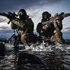 Royal Marines training could be watered down to let more women into the Navy following 'political pressure' over diversity targets