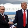 Moment US B2 stealth bomber thunders over Putin as he arrives at Alaska summit - but Russian president shrugs it off