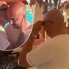 Arne Slot hits Ibiza! Liverpool manager celebrates Premier League title win as he's serenaded with Queen classic in private DJ booth - and receives a kiss from Wayne Lineker