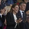 Kate Middleton beams as she cheers on England at the Women's Rugby World Cup - and her blonde hair is on display once again