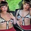 Lola Young puts on a VERY racy display in an underboob-flashing monokini before Glastonbury set - after Lorde sent fans into a frenzy by stripping off during surprise show