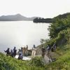 Japan retrieves remains of 1 of 2 service members whose training plane crashed