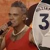Robbie Williams trolls Arsenal with Tottenham trophy joke while performing at the Emirates Stadium