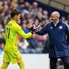 JEEPERS KEEPERS: Clarke is in a pickle after Slicker's debut disaster... but maybe throwing the young goalie back in for Liechtenstein game could still be the best way forward?