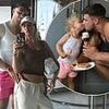 Tommy Fury puts on a loved-up display with Molly-Mae Hague and poses for sweet snaps with their daughter Bambi as he gushes about his 'lucky life'