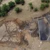 Water tanks replace springs on a Serbian mountain as drought endangers some 1,000 cows and horses
