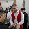 Brit arrested in Bali on drug charges avoids death penalty and is sentenced to 10 months in jail after 'taking a package of MDMA from a taxi driver'