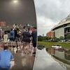 Shocking scenes as Brewers' parking lot is flooded and rain leaks through dome's roof amid severe storms
